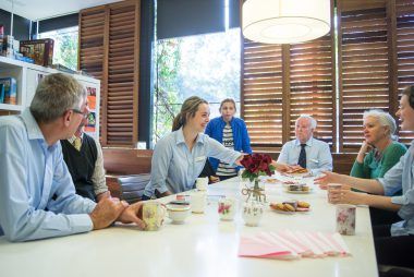 Country Club at Lifehouse Country Club members drink tea and biscuits around a table
